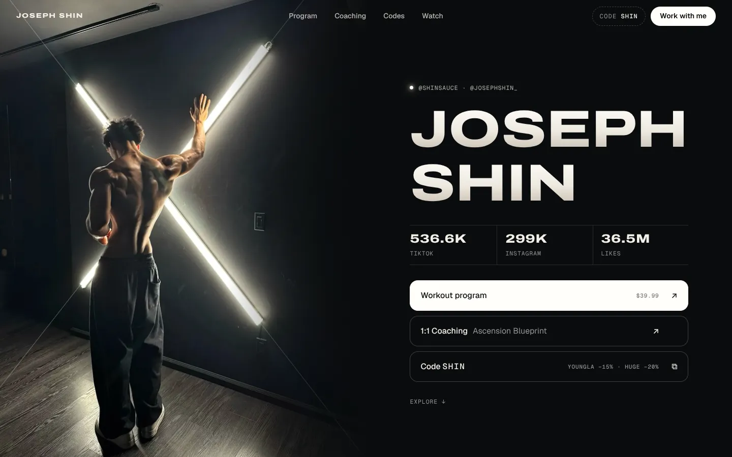 Home: Joseph Shin from behind next to two light tubes forming an x, with his social numbers and three links: program, coaching and the SHIN code