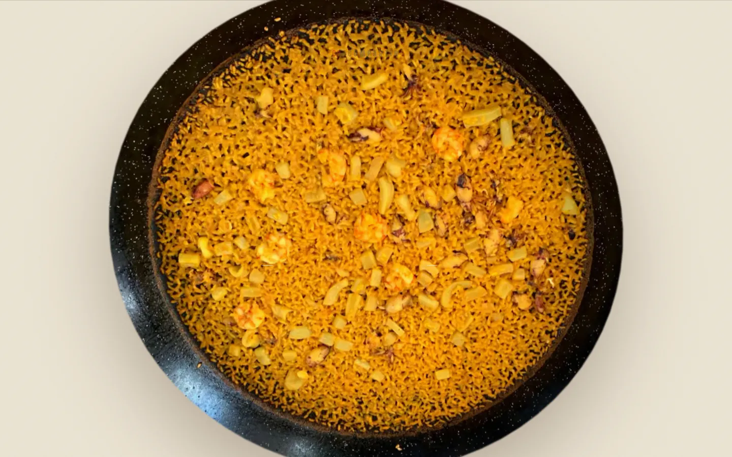 A paella seen from above, filling the screen